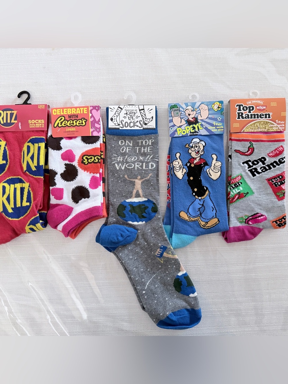 Pick One - Ritz, Reese’s, on top of the world, Popeye, top ramen